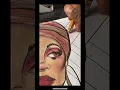 Practicing makeup looks on paper In the coloring book all about makeup