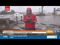 STORM CENTER Floodwaters crest banks at Winter Harbor before high tide hits