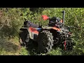 Suzuki quadrunner 250 on new land