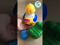 toy hen laying eggs