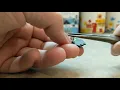 Removing a broken locking pinback