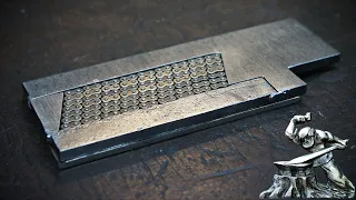 Experimental Damascus steel made from very, very fine chain.