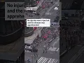 shows the moment people run in Times Square as shots are heard