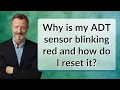 Why is my ADT sensor blinking red and how do I reset it