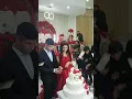 Angry groom loses it during wedding cake cutting ceremony, leaving guests and bride horrified