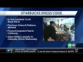 Starbucks workers sue over company s new dress code