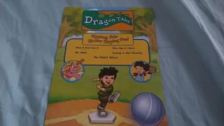 me showing the insert to the dragontales pfmpf dvd for flickalovareturns