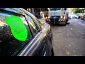 NYC shames parking-rule violators with big green stickers pasted onto cars