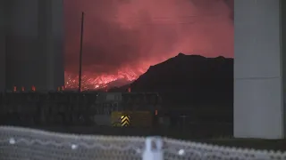 Fire burns under I-480 Valley View bridge