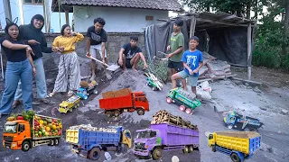 MUATAN KAYU, PASIR, BATU, BATA DAN BUAH MELEWATI LINTASAN BUKIT PASIR