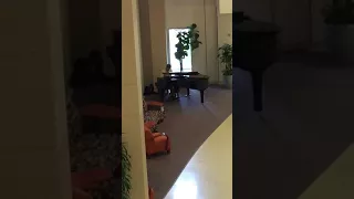 Piano player at Renown hospital
