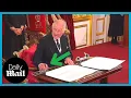 Download Lagu Moment King Charles III furiously motions for aide to move ink pot as he signs proclamation