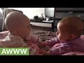 Download Lagu Baby twin sisters hold hands and talk for the first time