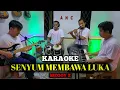 Download Lagu SENYUM MEMBAWA LUKA KARAOKE MEGGY Z NADA COWOK