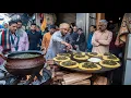 Download Lagu HARDWERKENDE MAN VERKOOPT PARATHA'S LANGS DE WEG | MAKKI ROTI MET DAHI SAAG - PAKISTAANSE STRAATV...