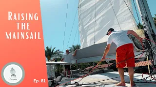 Raising the mainsail on our catamaran