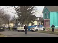 RPD Men arrested seen carrying body into car