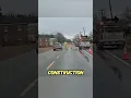 Driver Goes Around Flagger in Road Construction