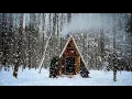 Lagu CAMPING in a TINY SHELTER during a SNOWFALL. I've stocked up on plenty of firewood for the travelers