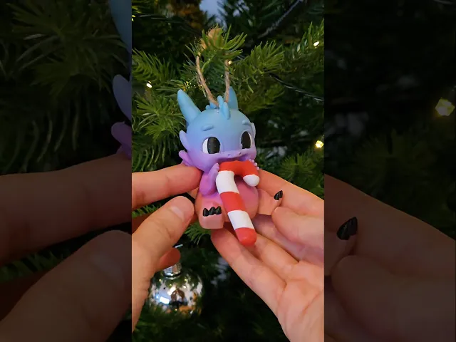 Baby Dragon eating Candy Cane + Christmas Ornament video thumbnail