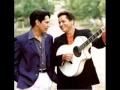 Download Lagu É Por Você Que Canto - Leandro \u0026 Leonardo