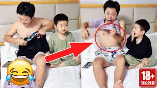 这坑爹太不靠谱了，只顾得看手机，孩子的衣服都能穿错！【笑场父子】
