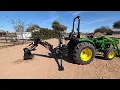 John Deere 4044M with new Woodmaxx backhoe for sale at C2C Equipment