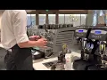 R Use black eagle coffee machine to make a latte in Starbucks
