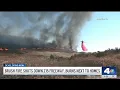 Brush fire shuts down 215 freeway burns next to homes