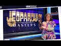 VICTORIA GROCE HOISTING ALEX TREBEK TROPHY FOR WINNING 2024 JEOPARDY MASTERS CHAMPIONSHIP NEW IMAGE