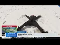 Kids adults play in the snow after Yucaipa cancels classes