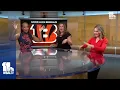 WBAL honors football bet with sister station WLWT