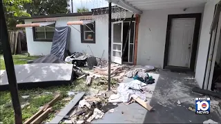 Mercedes crashes into Sunrise home injuring woman
