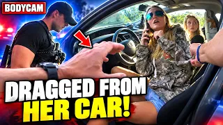 COPS DRAG WOMAN FROM HER CAR AND THROW HER TO THE GROUND OVER PROOF OF INSURANCE!