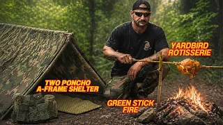 Solo Overnight Building a Two Poncho Shelter with a Green Stick Fire and Rotisserie in The Woods.