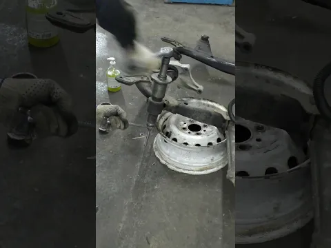 Subframe bushing installation with a threaded rod and adapters