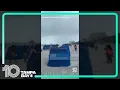 Waterspout appears on Clearwater Beach shoreline