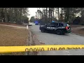 Man killed woman taken into custody after shooting in Lithonia