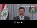 Lagu Saddam Hüseyin Amerika'ya ambargoyu kaldırması için konuşma yapıyor.