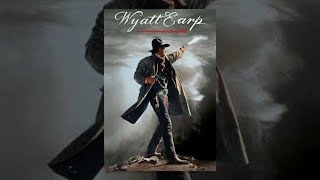 Kevin Costner as Wyatt Earp, firing a gun on the poster for the Wyatt Earp game