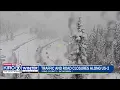 US 2 closed at Stevens Pass illegally parked cars blocking plows