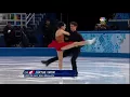 Tessa Virtue and Scott Moir kiss during Sochi 2014 FD warmup