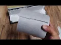 Everbilt Shower Systems wallboard corner mockup using the adhesive sealant and banding