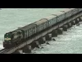 Download Lagu Train crossing Pamban bridge on a windy day.