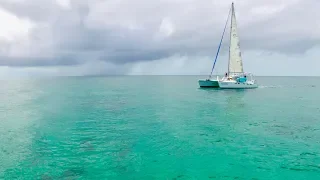 Catamaran motor sailing across a GLASSY Bahama Bank!