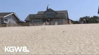 Cannon Beach homeowner battles Oregon over sand burying historic property