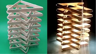 Instructions on how to make a beautiful multi-tiered night light from discarded ice cream sticks.