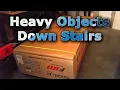How to move heavy objects down stairs