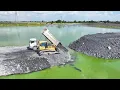 Download Lagu Nice Amazing Making Long Road in Big Lake by SHANTUI DH17 Dozer push big rock with Truck