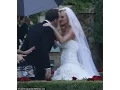 Jenny McCarthy is every inch theglamorous bride as she marries Donnie Wahlberg in an intimate